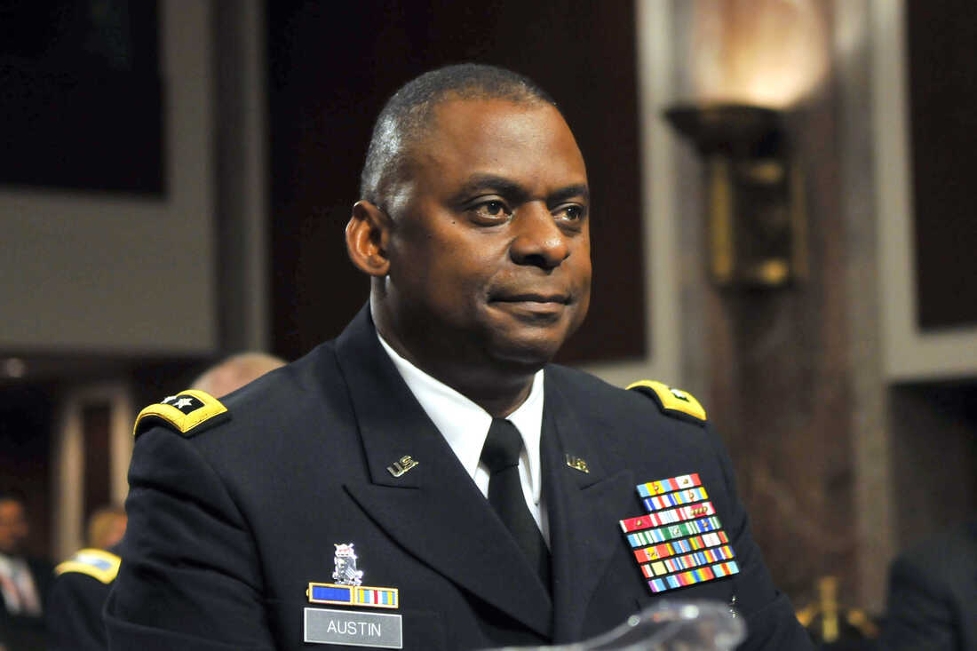 US Army Lt. Gen. Lloyd Austin III sits a