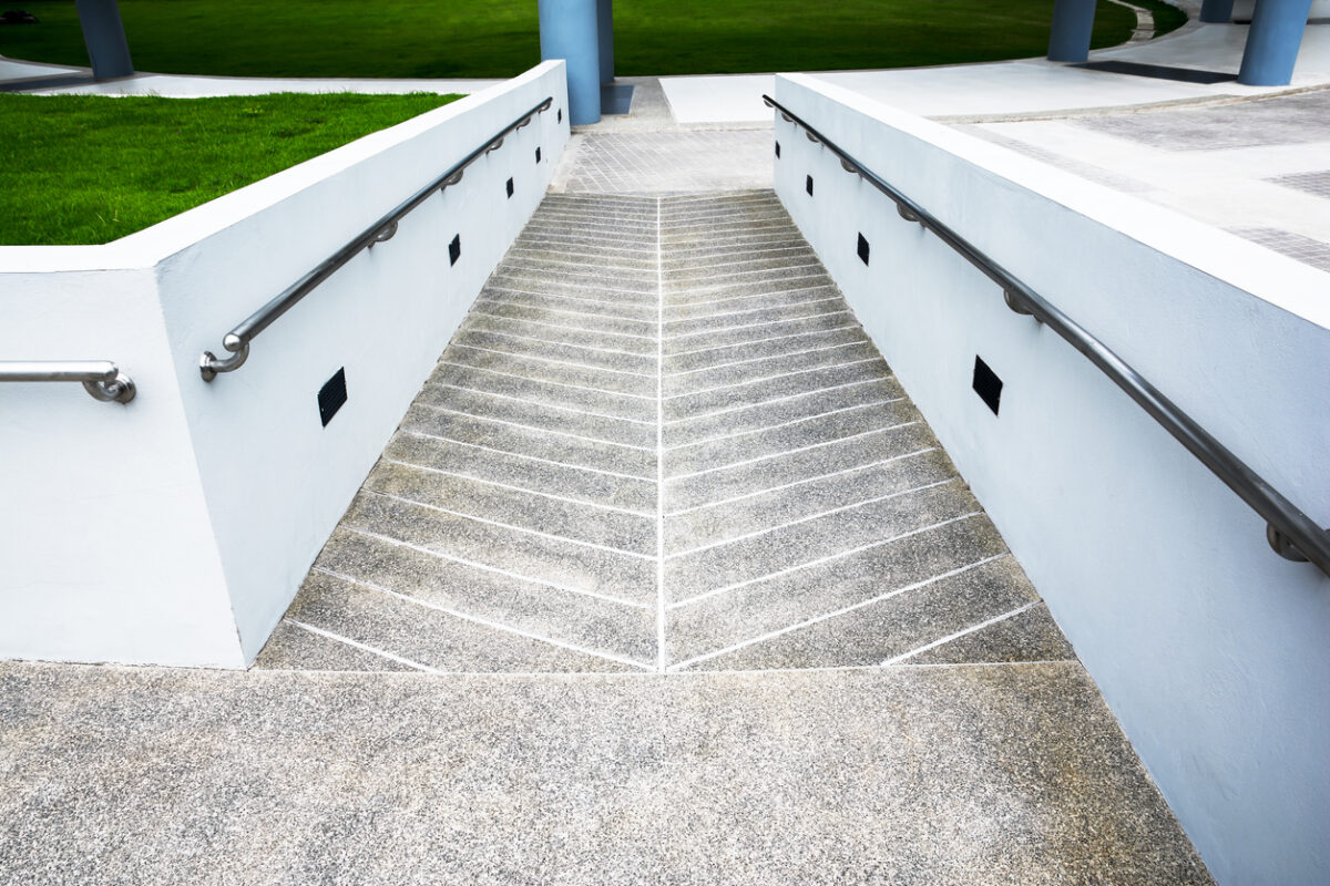 Ramp for wheelchair at the building background